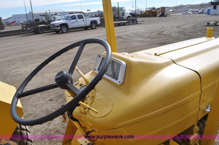 image for item F2235 Ford tow tractor