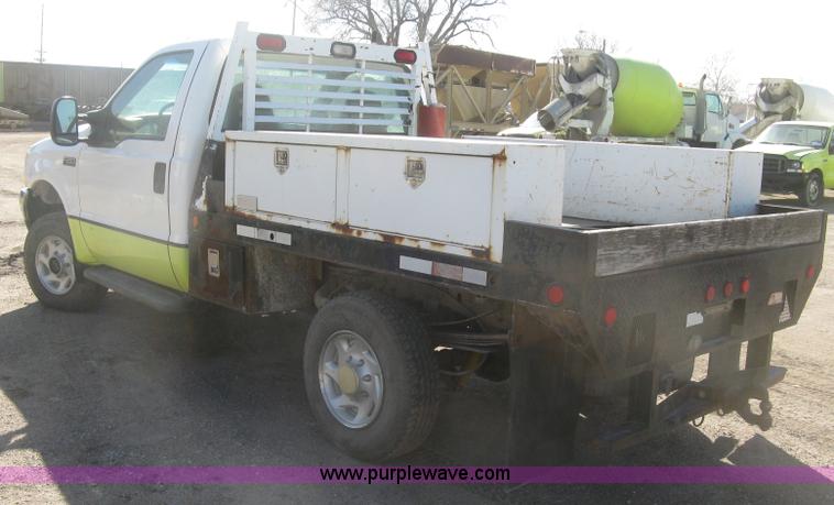 image for item K2861 2002 Ford F250 Super Duty XLT flatbed pickup truck