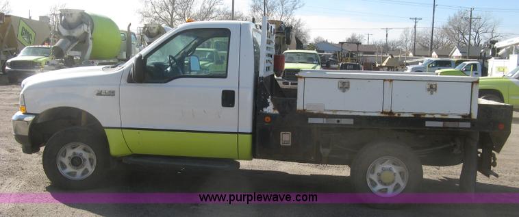 image for item K2861 2002 Ford F250 Super Duty XLT flatbed pickup truck