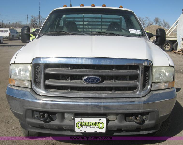 image for item K2861 2002 Ford F250 Super Duty XLT flatbed pickup truck