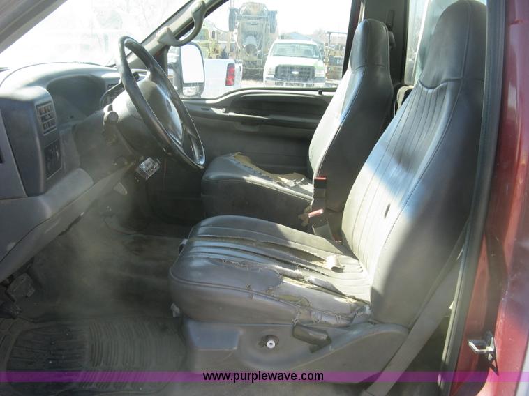 image for item K2861 2002 Ford F250 Super Duty XLT flatbed pickup truck