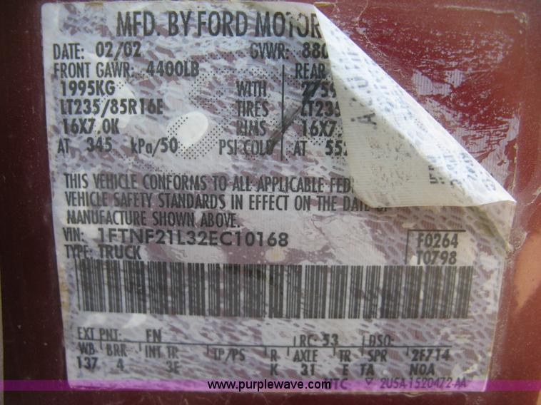 image for item K2861 2002 Ford F250 Super Duty XLT flatbed pickup truck