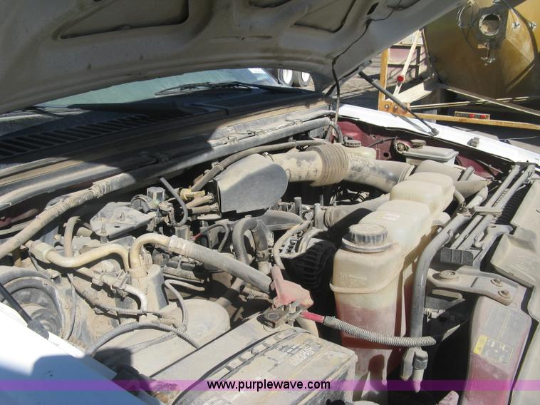 image for item K2861 2002 Ford F250 Super Duty XLT flatbed pickup truck