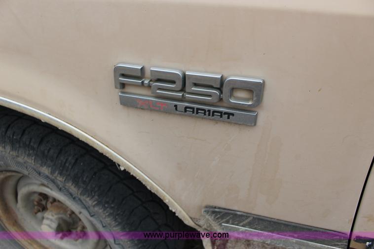image for item L6572 1991 Ford F250 HD XLT Lariat SuperCab utility truck