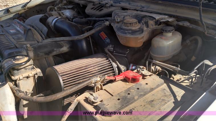 image for item L6622 2006 Ford F250 Super Duty flatbed pickup truck