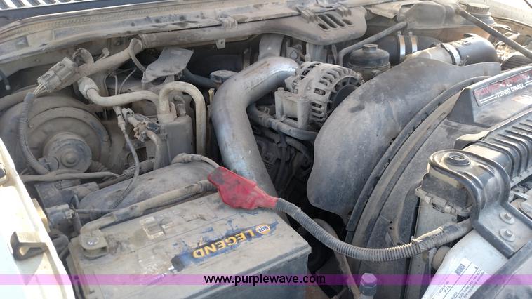 image for item L6622 2006 Ford F250 Super Duty flatbed pickup truck