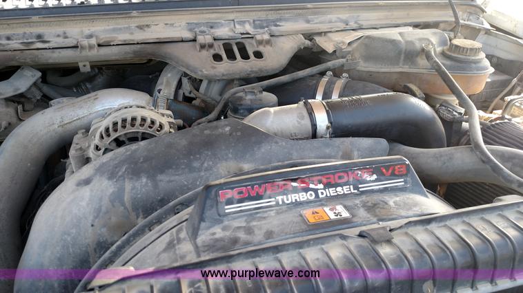 image for item L6622 2006 Ford F250 Super Duty flatbed pickup truck