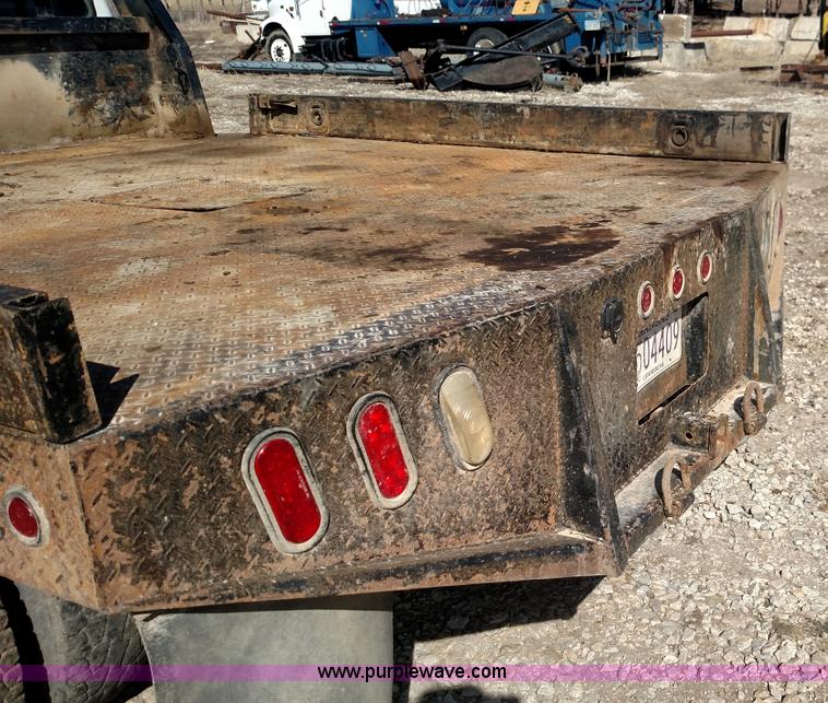 image for item L6622 2006 Ford F250 Super Duty flatbed pickup truck