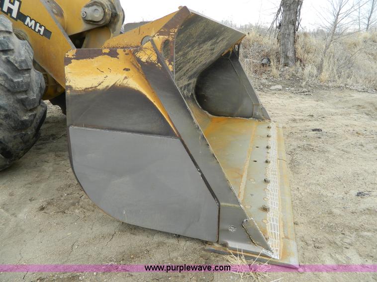 image for item D6133 2001 John Deere 744H wheel loader