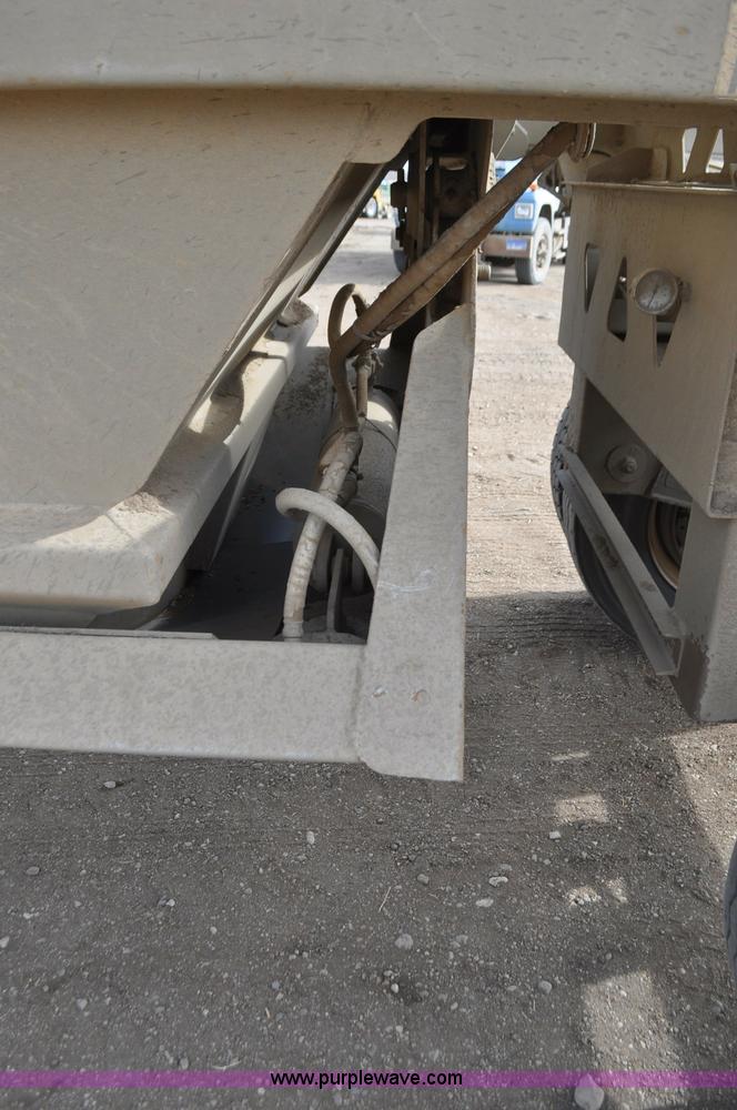 image for item F2215 2009 Trail King TKBDP11-202 bottom dump trailer