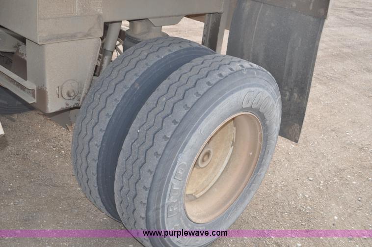 image for item F2215 2009 Trail King TKBDP11-202 bottom dump trailer