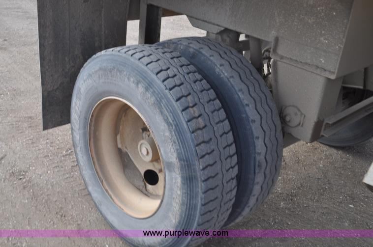 image for item F2215 2009 Trail King TKBDP11-202 bottom dump trailer