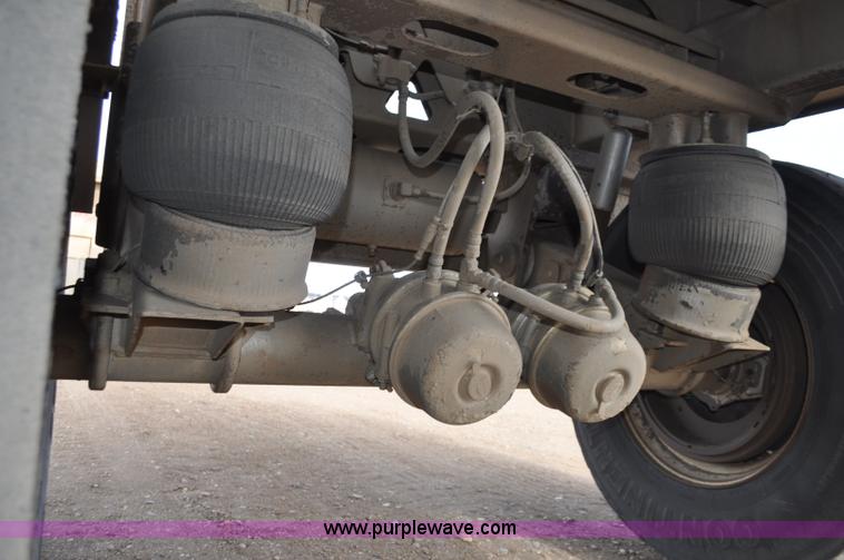 image for item F2215 2009 Trail King TKBDP11-202 bottom dump trailer