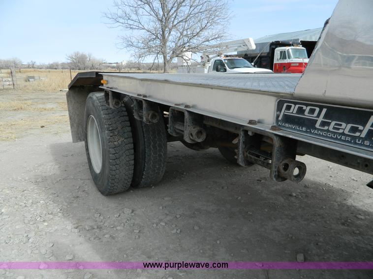 image for item H2264 1998 Chevrolet C6500 flatbed truck