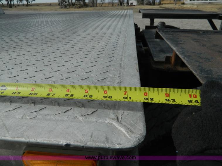 image for item H2264 1998 Chevrolet C6500 flatbed truck