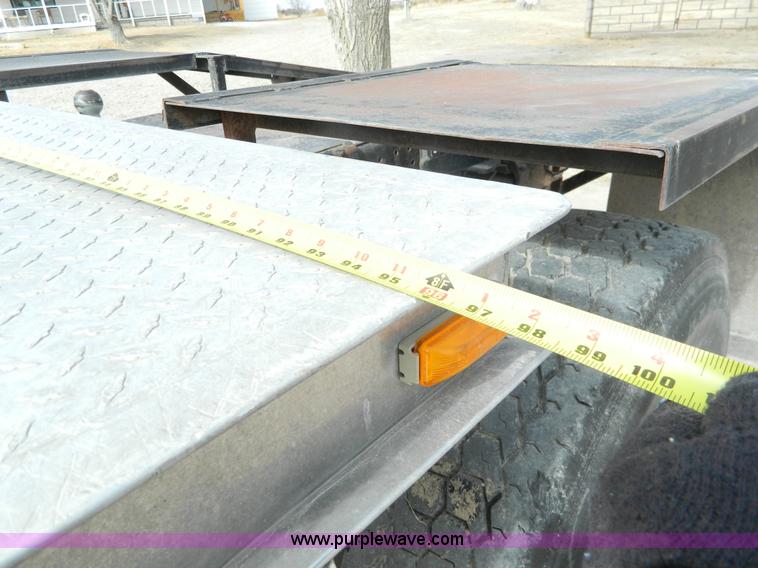 image for item H2264 1998 Chevrolet C6500 flatbed truck