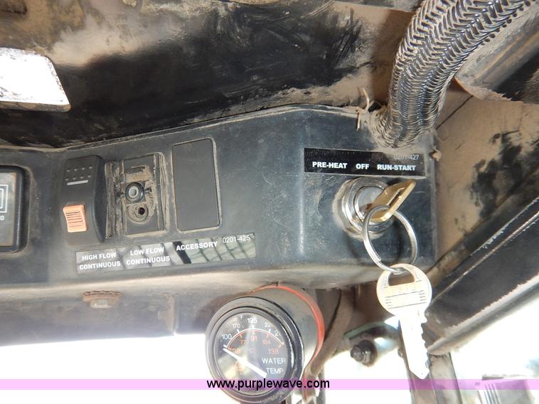 image for item I5069 2007 ASV RC100 R series posi-track skid steer with mulcher attachment