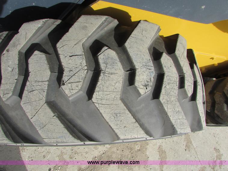 image for item I6601 2012 John Deere 332D skid steer