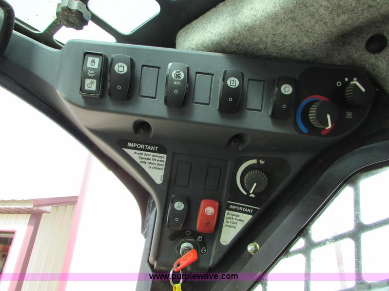 image for item I6601 2012 John Deere 332D skid steer