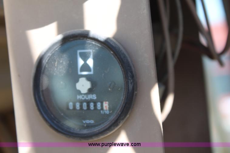 image for item K7148 1997 John Deere 770BH articulated motor grader