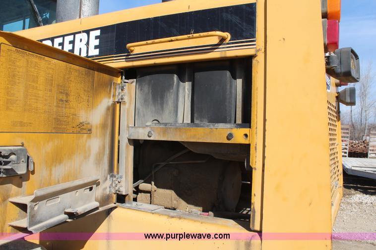 image for item K7148 1997 John Deere 770BH articulated motor grader