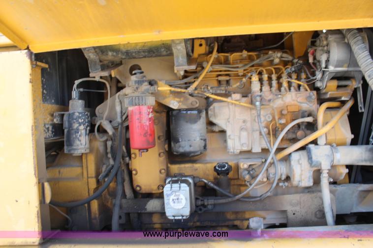 image for item K7148 1997 John Deere 770BH articulated motor grader