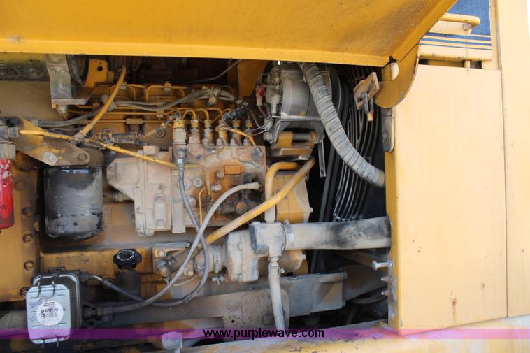 image for item K7148 1997 John Deere 770BH articulated motor grader