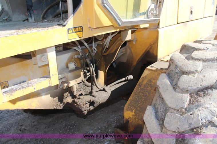 image for item K7148 1997 John Deere 770BH articulated motor grader