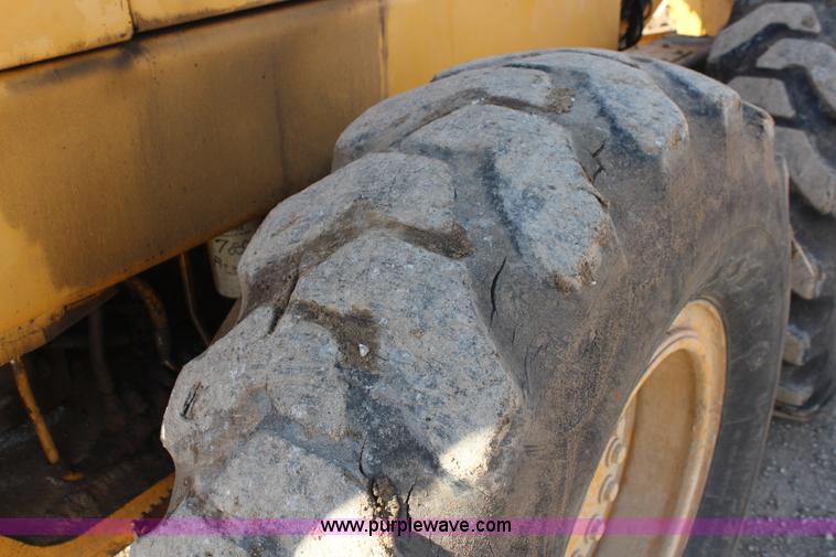 image for item K7148 1997 John Deere 770BH articulated motor grader