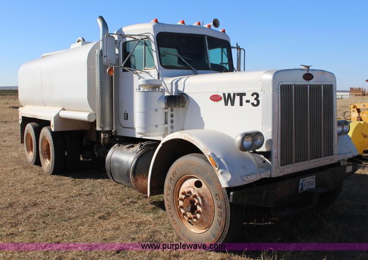 image for item L6674 1986 Peterbilt 359 water truck