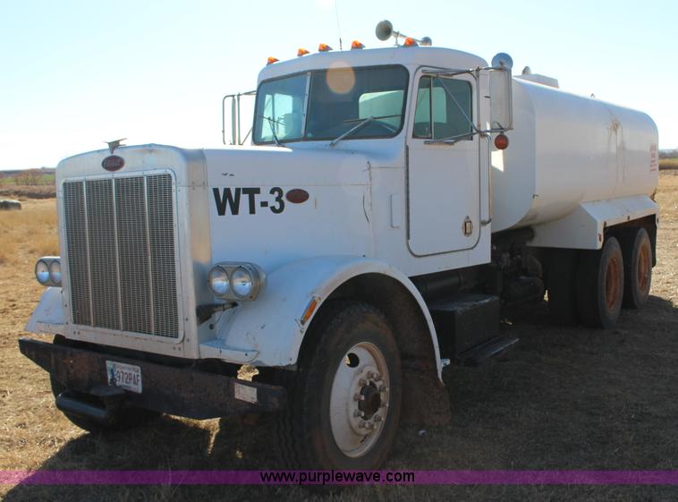 image for item L6674 1986 Peterbilt 359 water truck