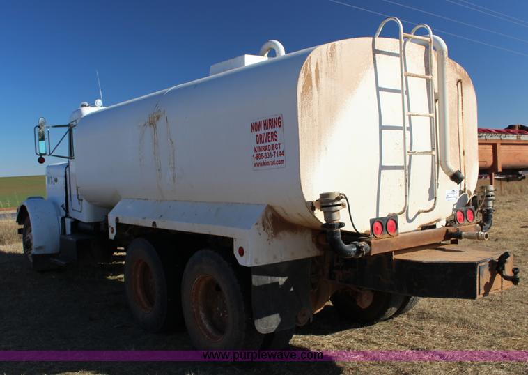 image for item L6674 1986 Peterbilt 359 water truck