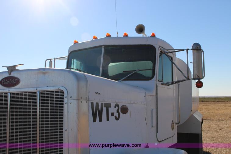 image for item L6674 1986 Peterbilt 359 water truck