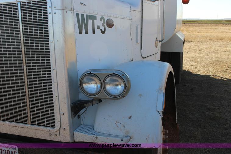image for item L6674 1986 Peterbilt 359 water truck