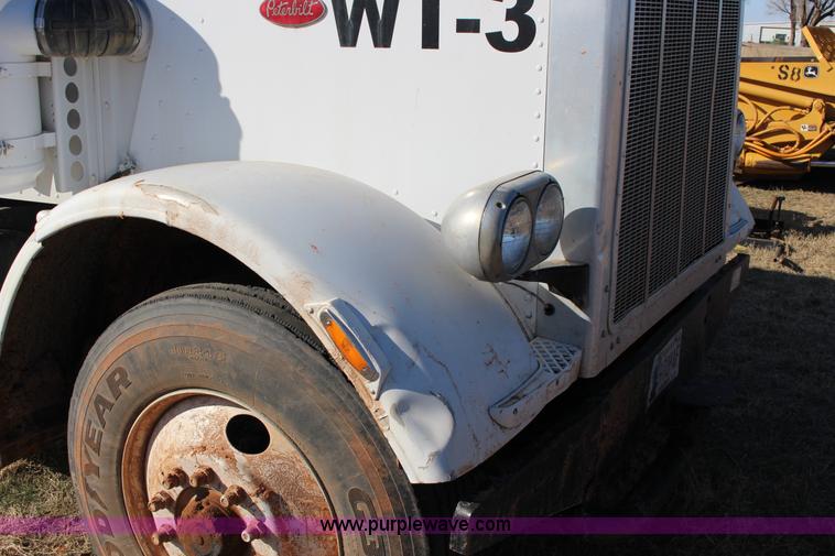 image for item L6674 1986 Peterbilt 359 water truck