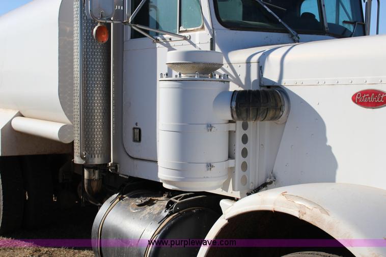 image for item L6674 1986 Peterbilt 359 water truck