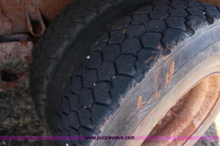 image for item L6674 1986 Peterbilt 359 water truck