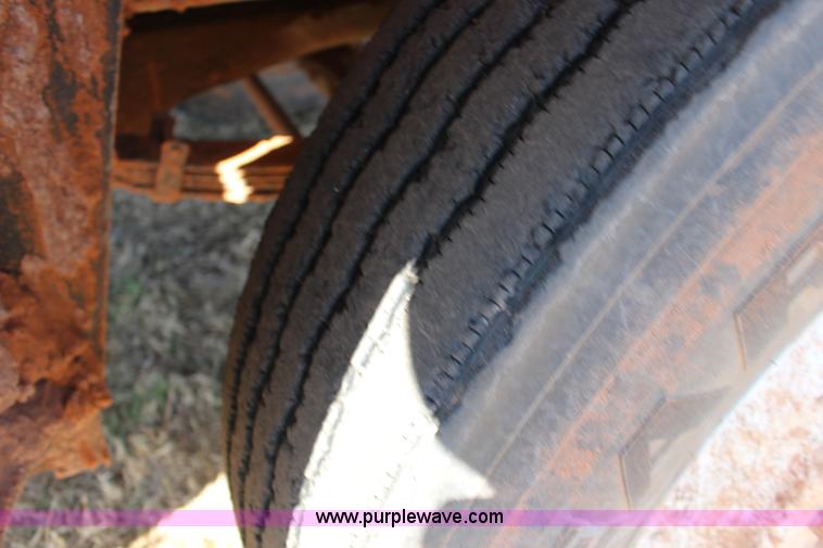 image for item L6674 1986 Peterbilt 359 water truck