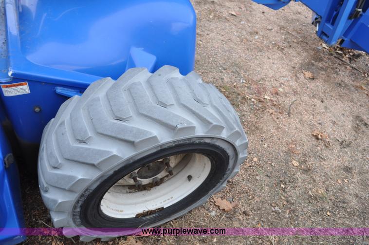 image for item F2102 2002 Up Right AB46 Bi-Energy boom lift