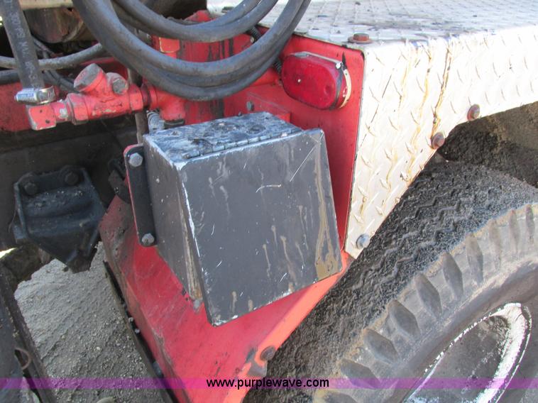 image for item I4044 1994 Ford F700 oil distributor truck