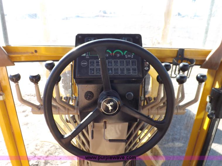 image for item K3227 2001 John Deere 772CH motor grader