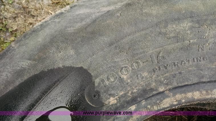 image for item AX9477 (2) International tractor tires and wheels
