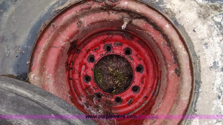 image for item AX9477 (2) International tractor tires and wheels