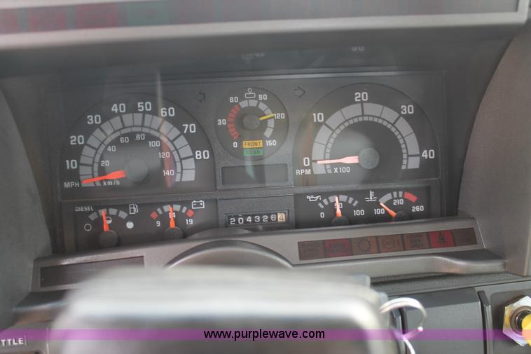 image for item H1575 2002 Chevrolet C8500 flatbed truck