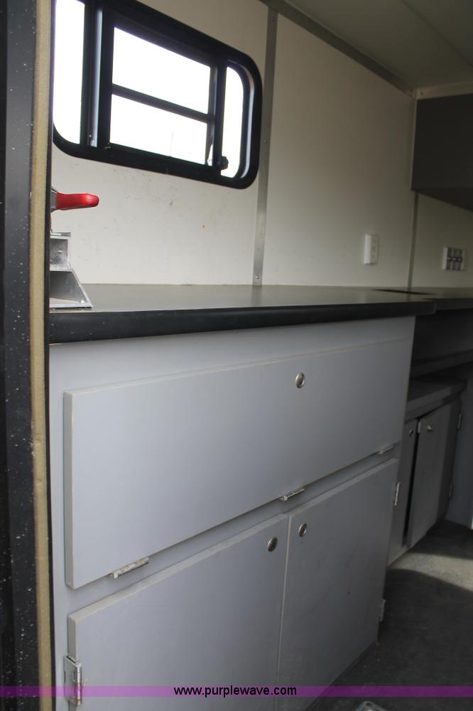 image for item H1576 2002 Coachcraft enclosed fiber optics splitting trailer