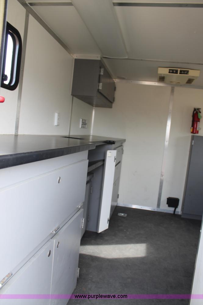 image for item H1576 2002 Coachcraft enclosed fiber optics splitting trailer