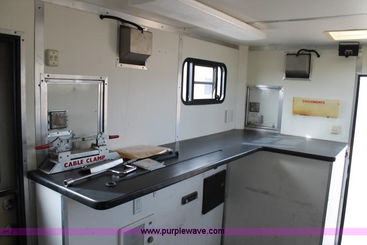 image for item H1576 2002 Coachcraft enclosed fiber optics splitting trailer