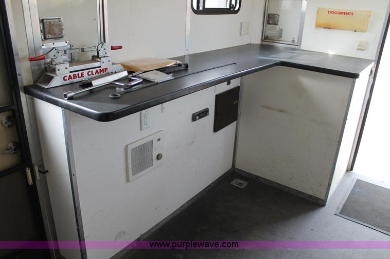 image for item H1576 2002 Coachcraft enclosed fiber optics splitting trailer