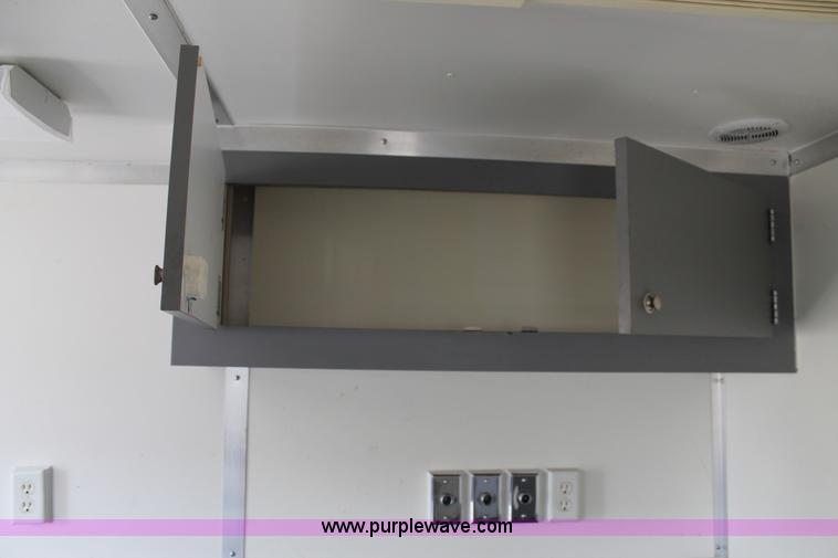 image for item H1576 2002 Coachcraft enclosed fiber optics splitting trailer