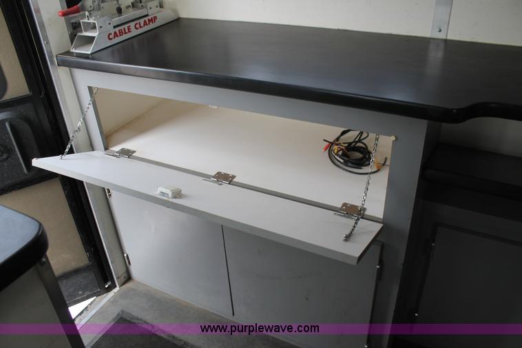 image for item H1576 2002 Coachcraft enclosed fiber optics splitting trailer